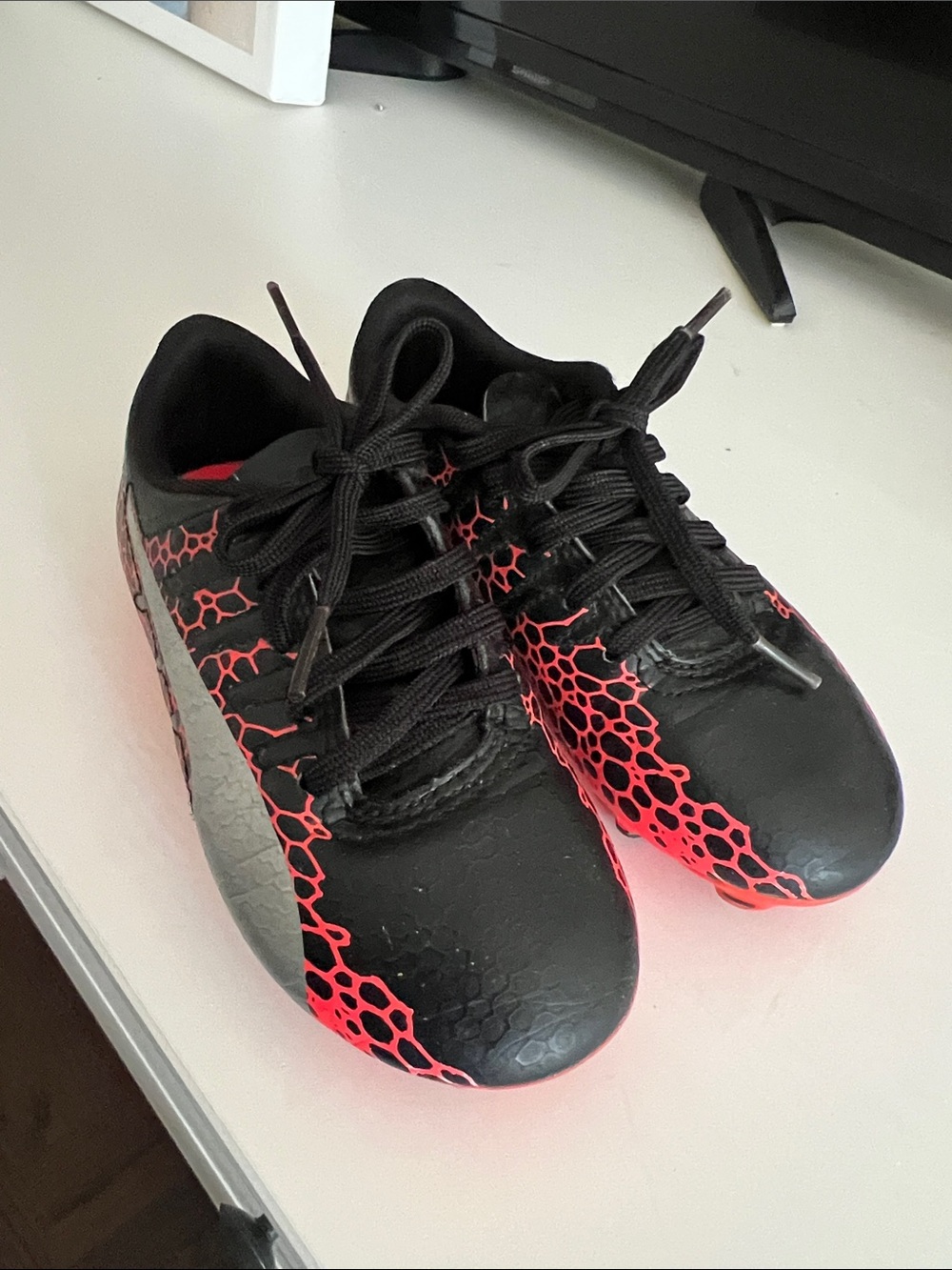Kids Black and Neon Pink Soccer Cleats